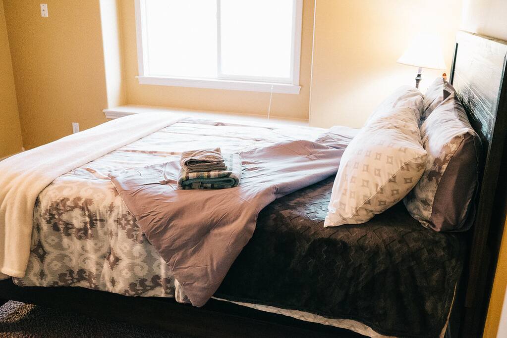 Master bedroom with brand new Queen size bed and mattress and attached master bath