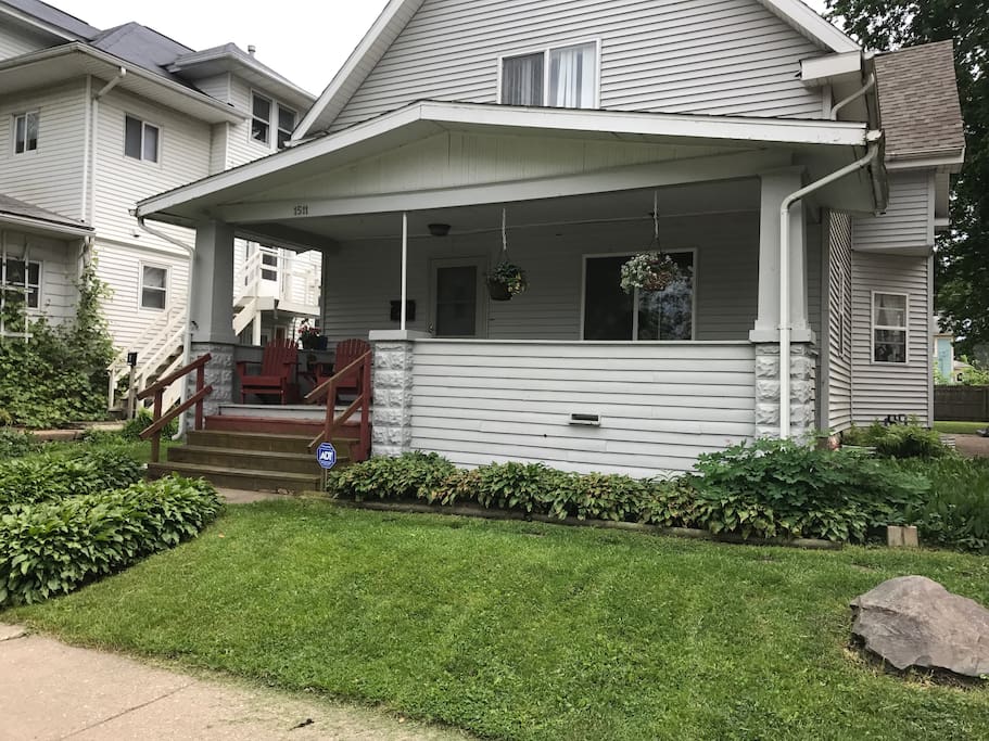 Street view of house with porch.