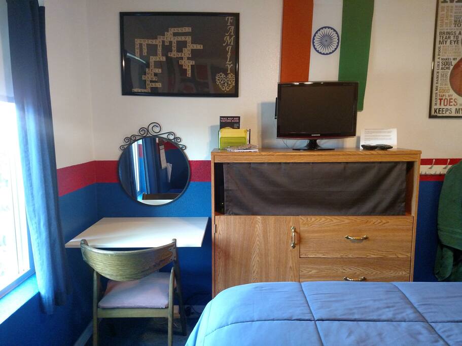 International Comfort, view from the bed with the desk up, TV and mirror