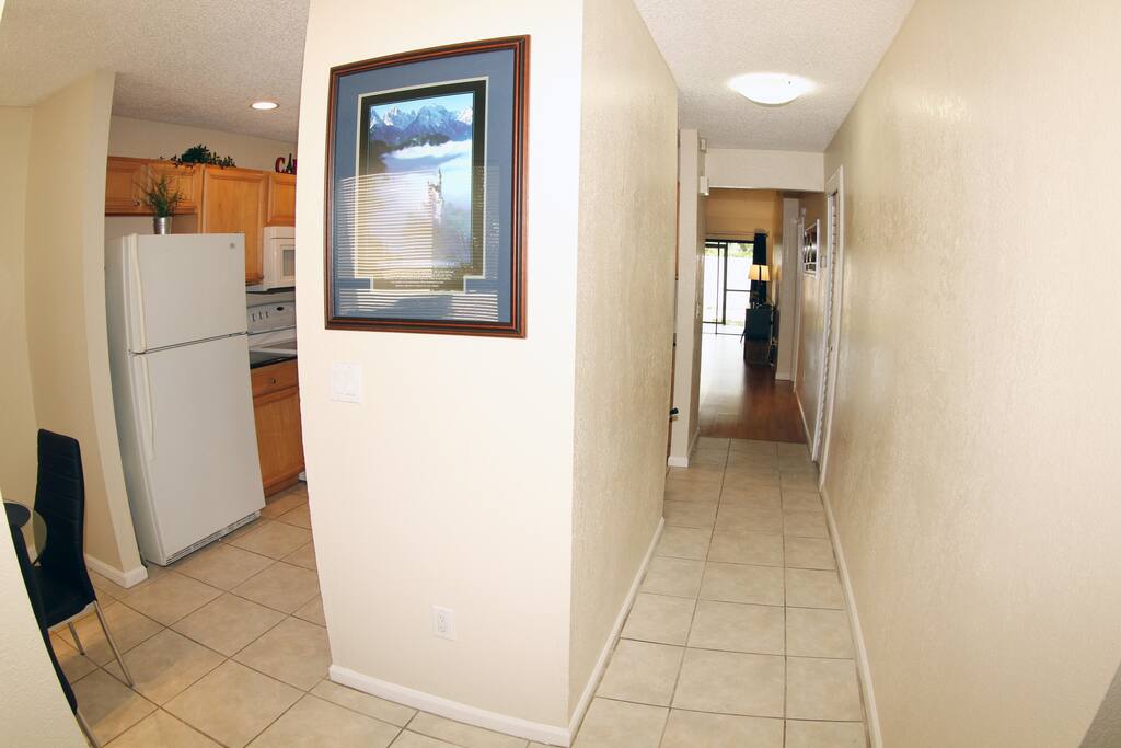 walking in - to the left are 2 bedrooms and to the right is the kitchen and breakfast nook