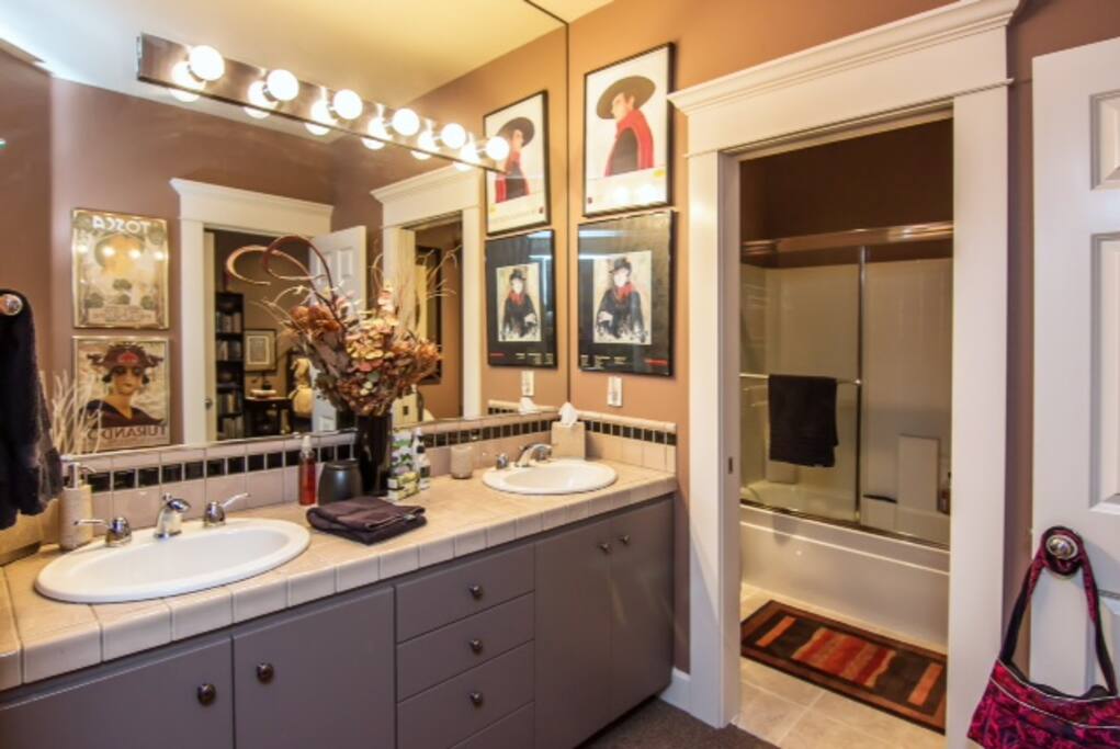 Bath with double vanity and shower/tub/toilet in separate space