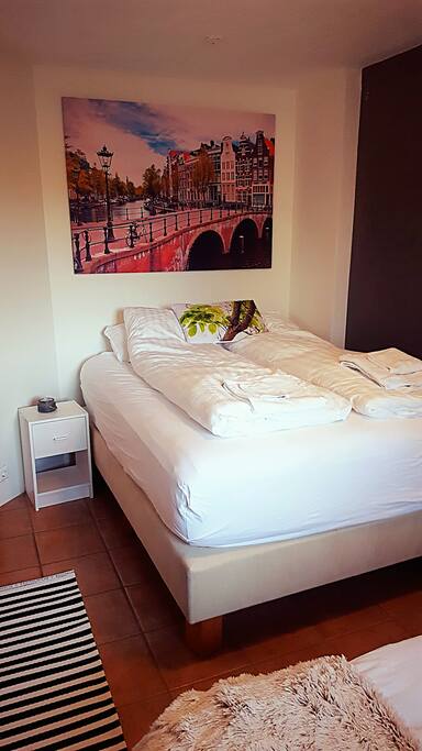 A comfy double bed.