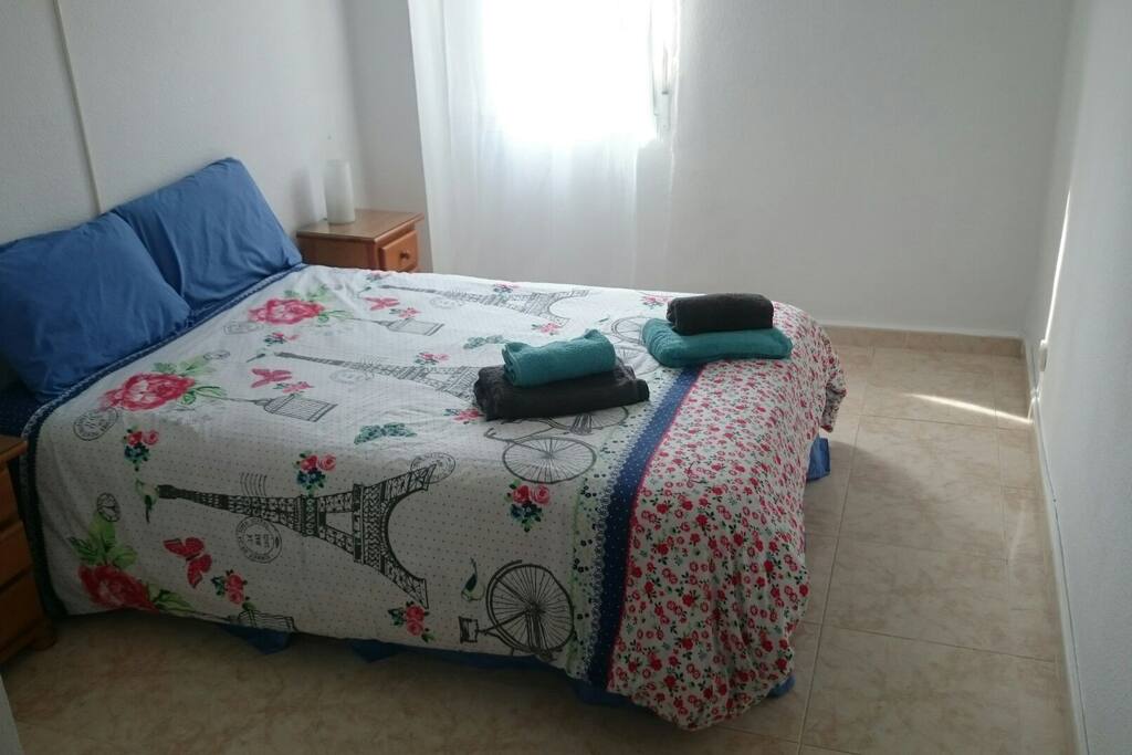 Large room, double bed. drawers, wardrobe. ceiling fan. double glazing, mozzie nets, shutters