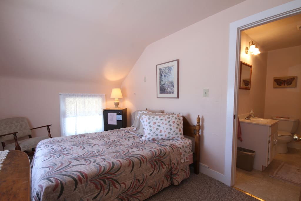 3rd floor room with double bed and private bath
