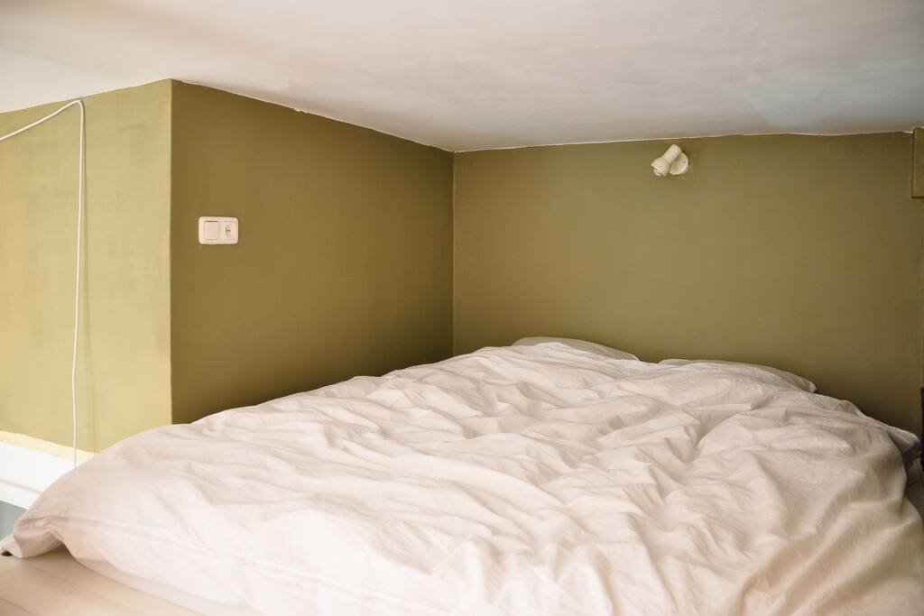 Cozy mezzanine bed