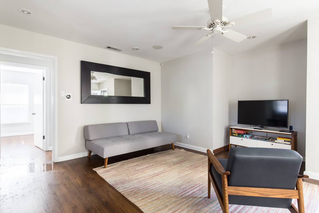 Open concept living room with plenty of light.