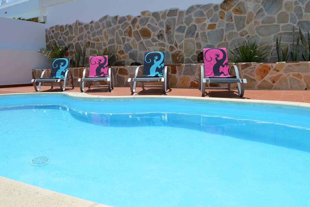 Private Heated Pool with lounge chairs