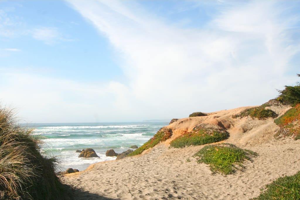 The beach is a 3 min walk from the house