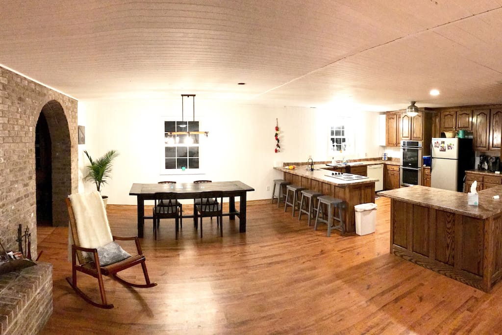 Large open Living, Dining, Kitchen . Archway to left leads to Bdrm #3/ Sunroom