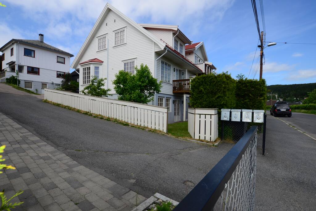 Free parking in Årvollveien (close to entrance), or parking behind the house
