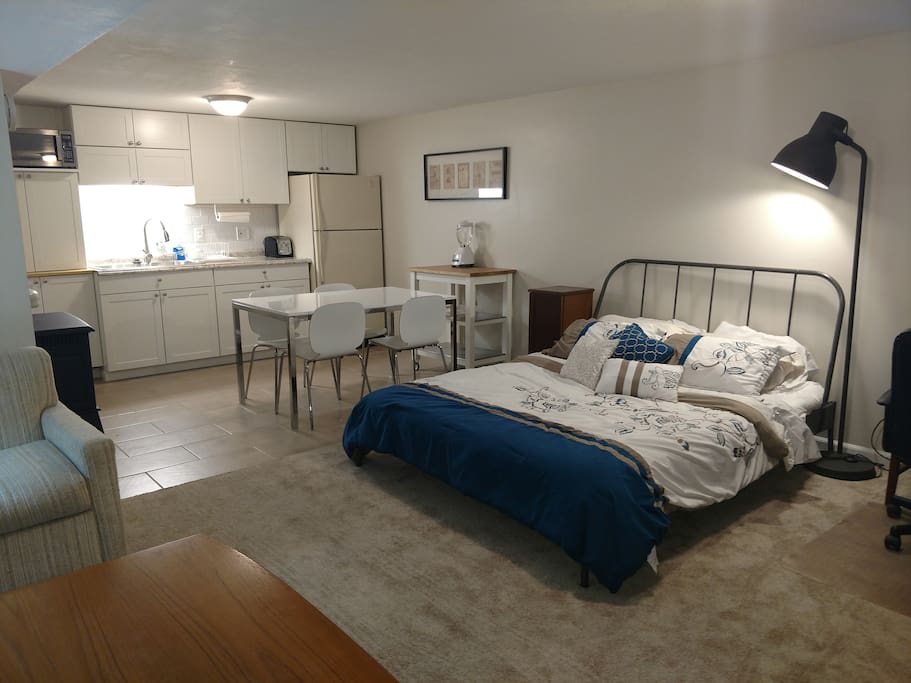Queen size bed and kitchenette