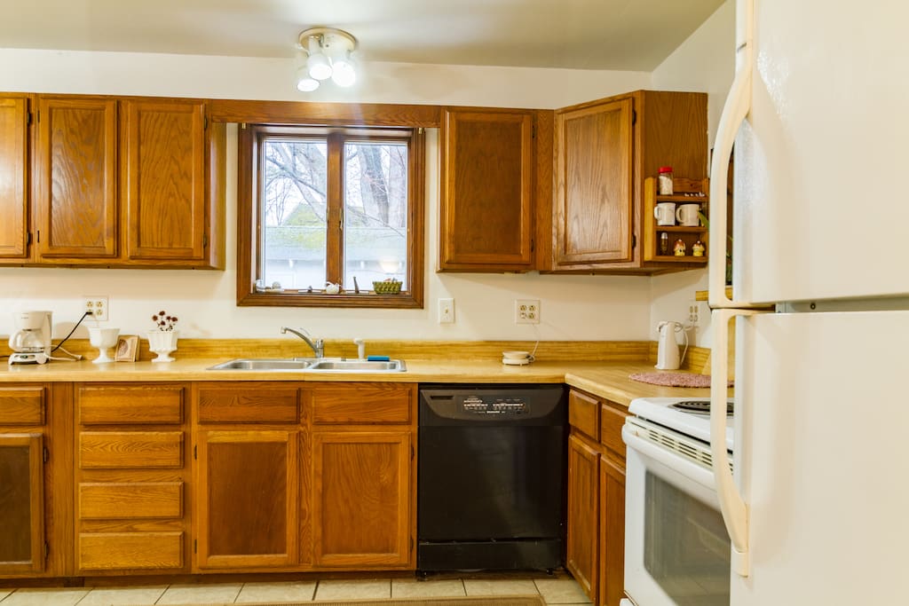Dishwasher and double sink drawers hold silver and towels