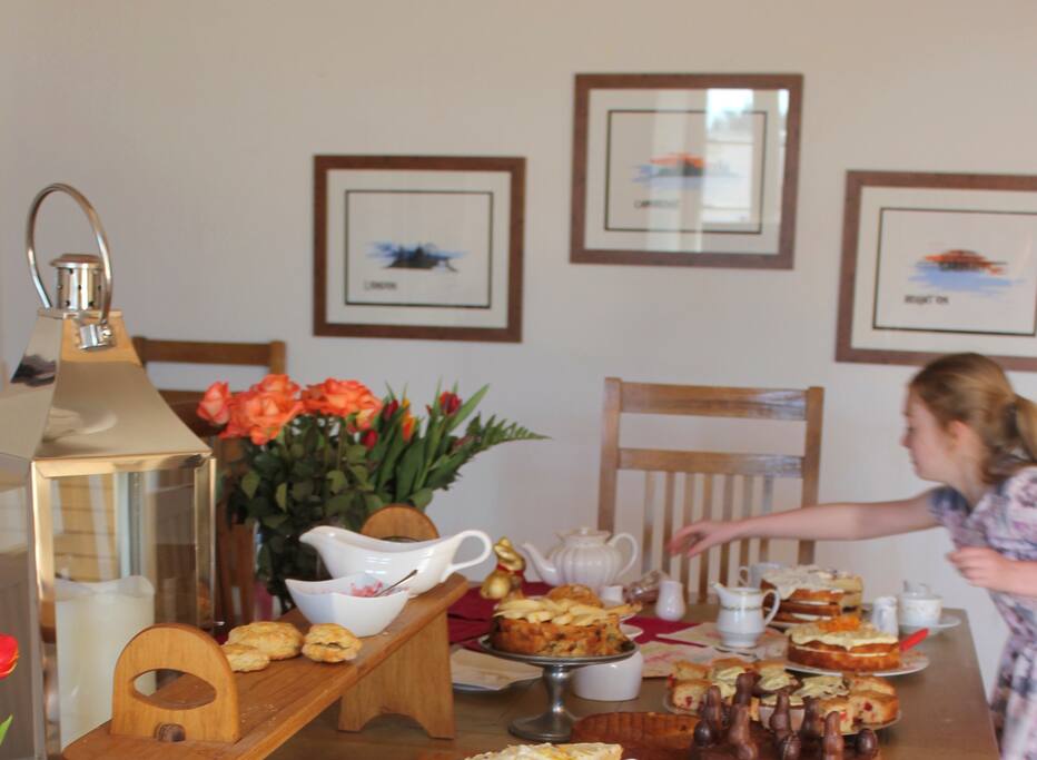 The dining room table is large enough to seat 10 people comfortably.