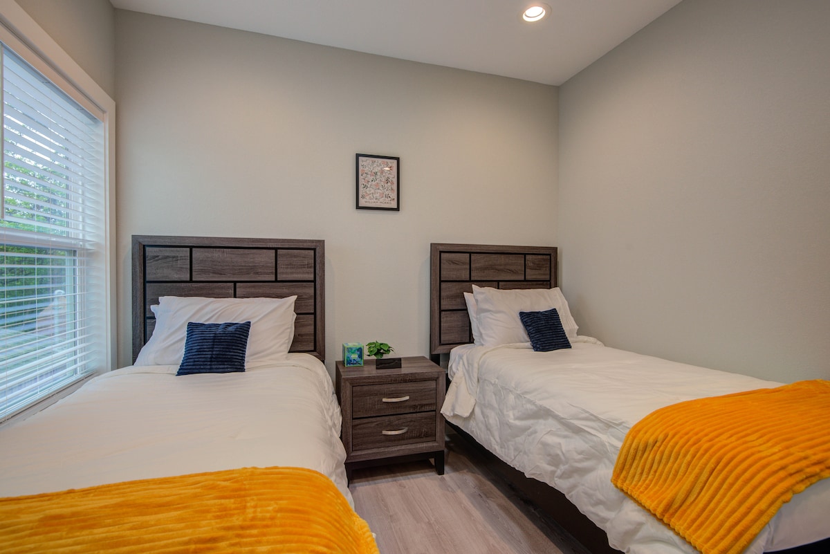 Dormitorio secundario con dos camas de una plaza