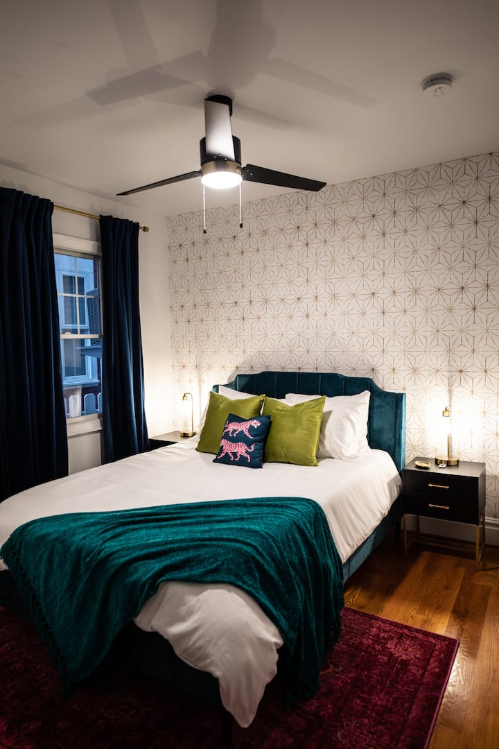 This bedroom is located on the first floor with blackout curtains.