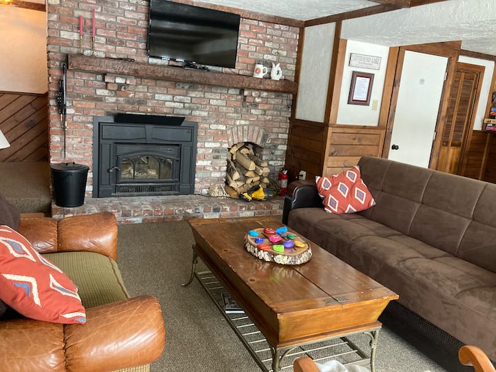 Bedroom 4 doubles as the game room on lower level . 

Futon couch folds out to comfortable small double bed 
Access to TV for streaming 
Fireplace 
Full bathroom on lower level 
