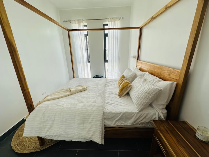 Comfy king size bed for an energizing sleep! 
We now have added room-darkening curtains in all bedrooms.