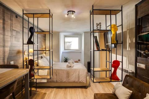 Top performing Airbnb: The Designer's House – downtown with parking in Brescia