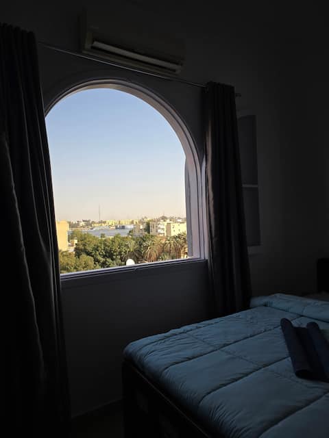 Private & Central 2BR in West Bank - Nile View