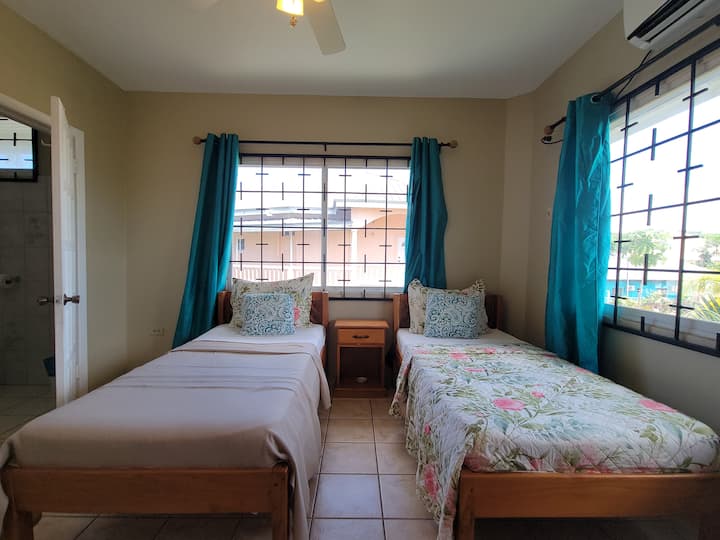 2 single beds upstairs