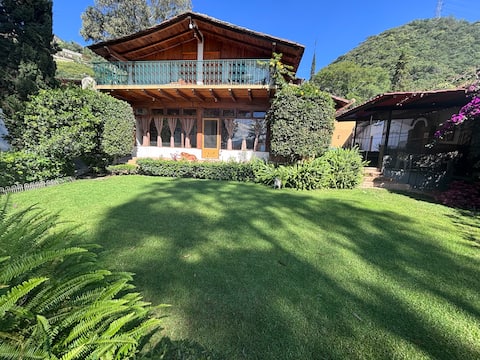 House in front of the lake