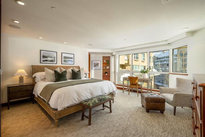 501 Master Bedroom - the grand suite with king bed, views of the upper village, huge ensuite bathroom with soaker bath, television, working desk and sitting area.