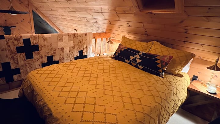 Baby loft over the living room. 

Feather down duvet in Winter. 