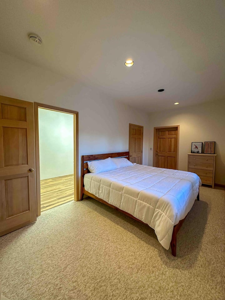 Guest suite with king size bed and attached full bath