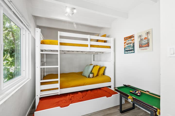 Third bedroom features 2 full size beds with a trundle pull-out that's twin-sized, and a closet. There is also an airbed that can be set up. Mini pool table, board games and children’s books available. This room has blackout blinds.