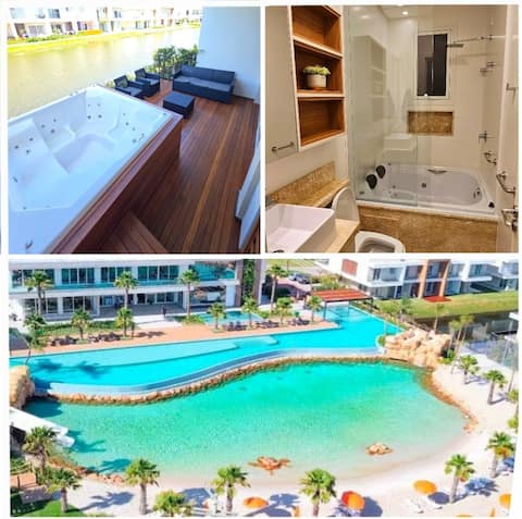 Lakefront house with bathtub.
Atlântida / Capão