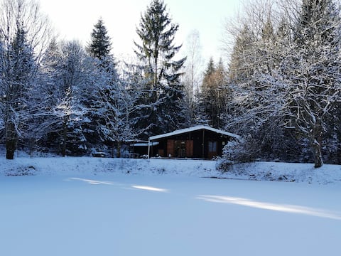Cottage by a pond near Vosges.