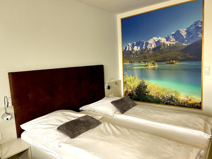 Krevat me fotografi të madhe