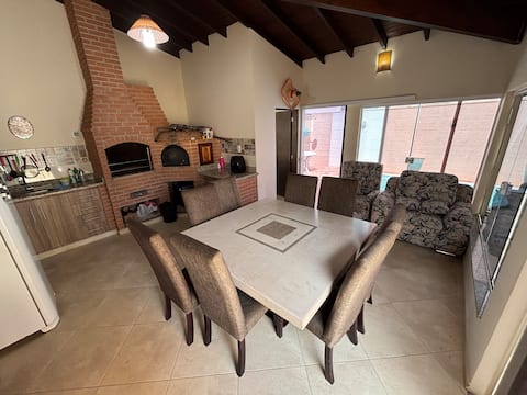 House with pool in condominium