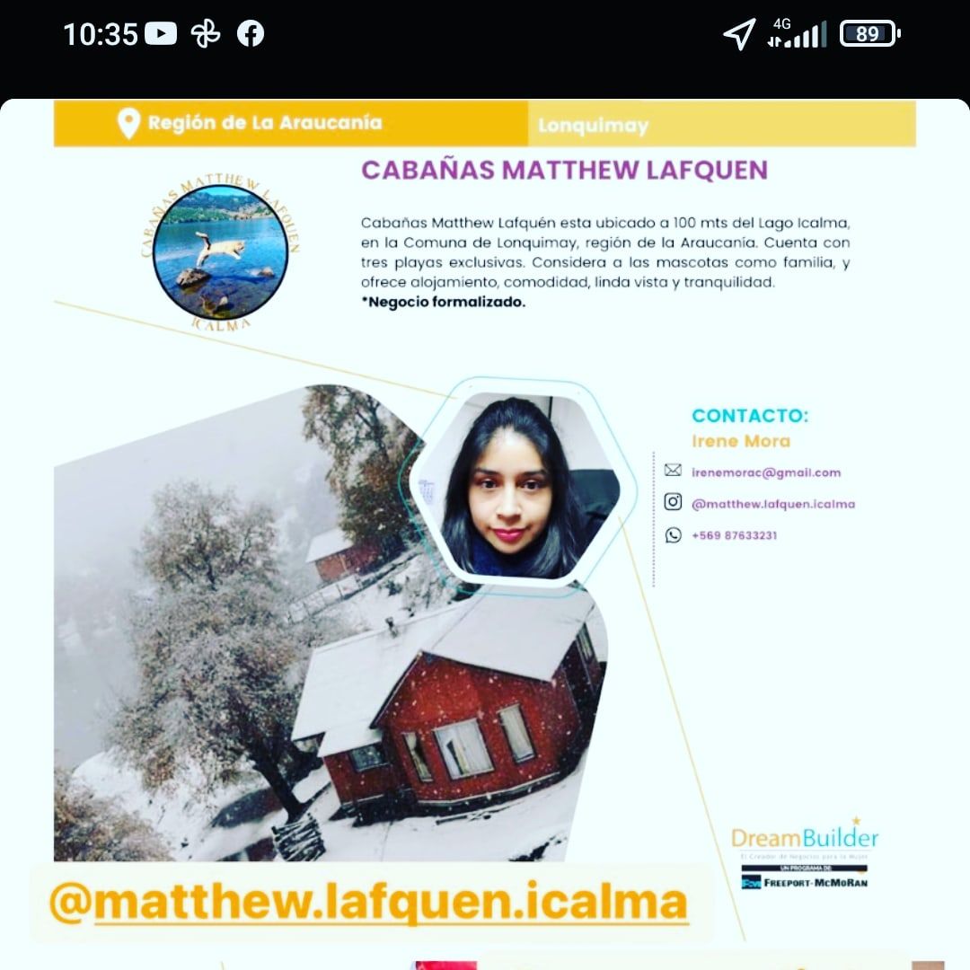 A rustic cabin is nestled amidst a snowy landscape, showcasing vibrant red exterior walls. The roof is blanketed in snow, and evergreen trees frame the scene. Soft white snow covers the ground, creating a serene winter atmosphere.