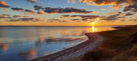 Strandly peace and idyllic in the first row to the water