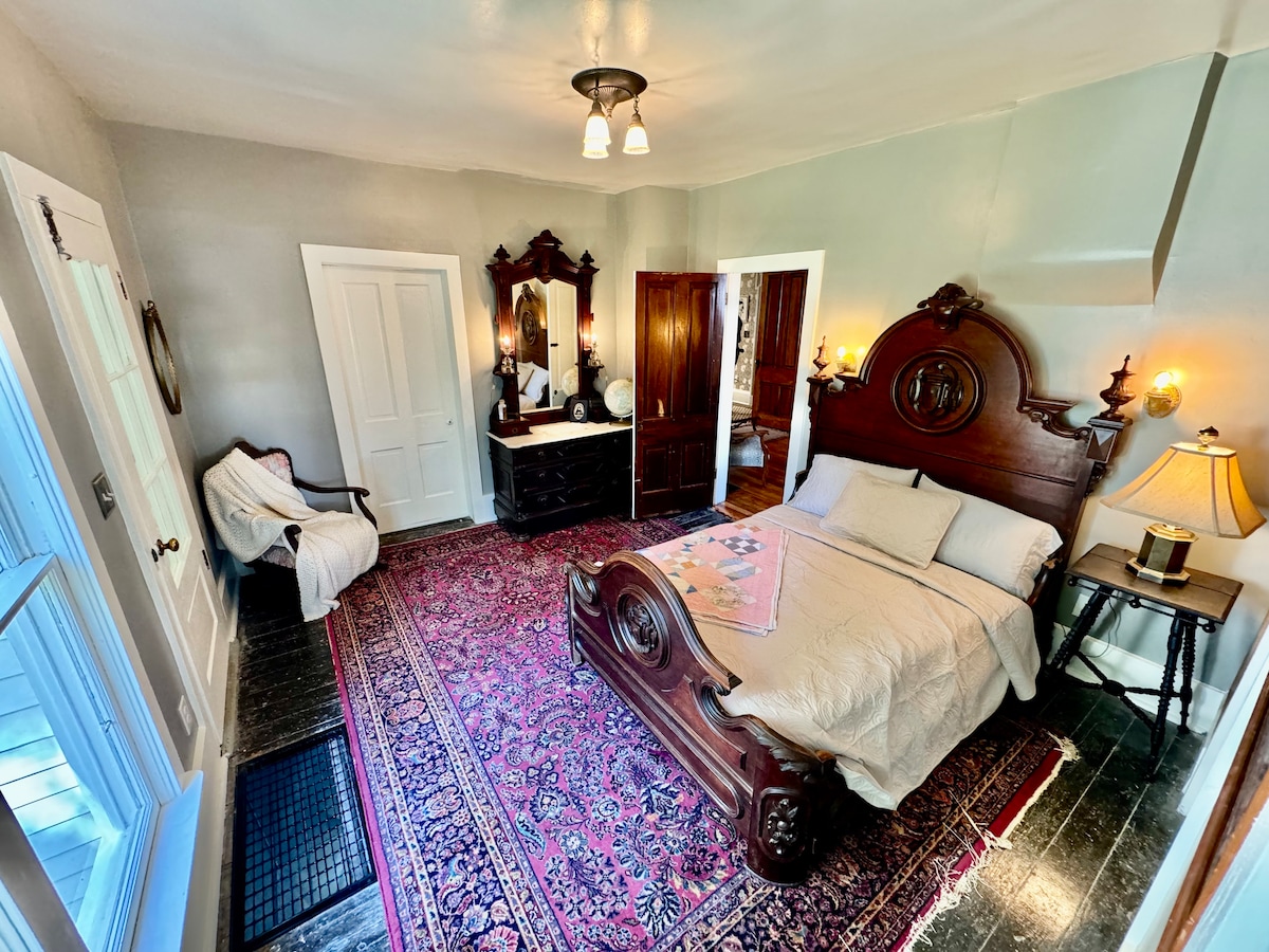 Downstairs bedroom  access to the bathroom is through this bedroom.  