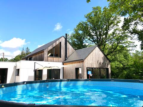 Modern wooden house in the heart of nature