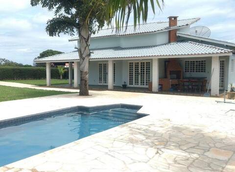 House with pool in condominium