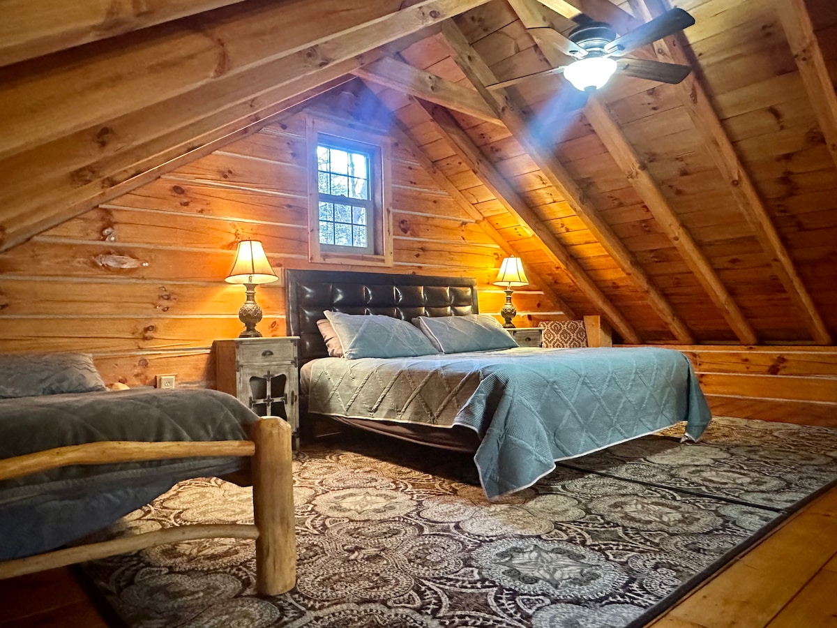The Loft includes a king and twin sized beds