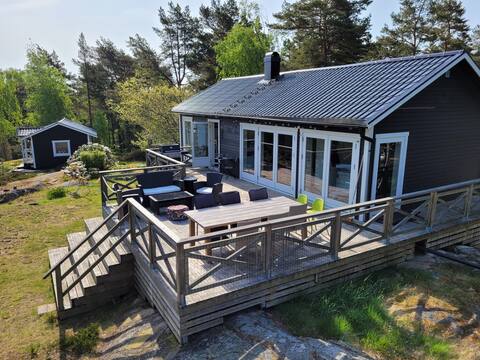 Modern cabin with sea view & private beach