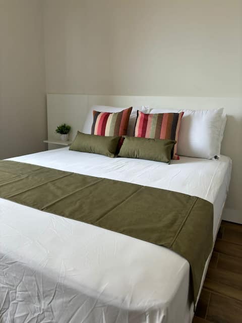 House with garage and barbecue area