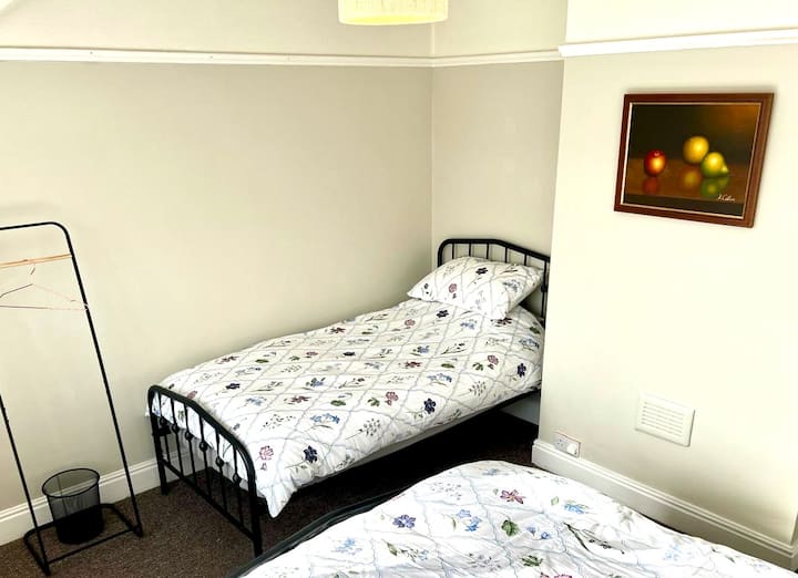 Bedroom 2 has one double bed and one single bed
