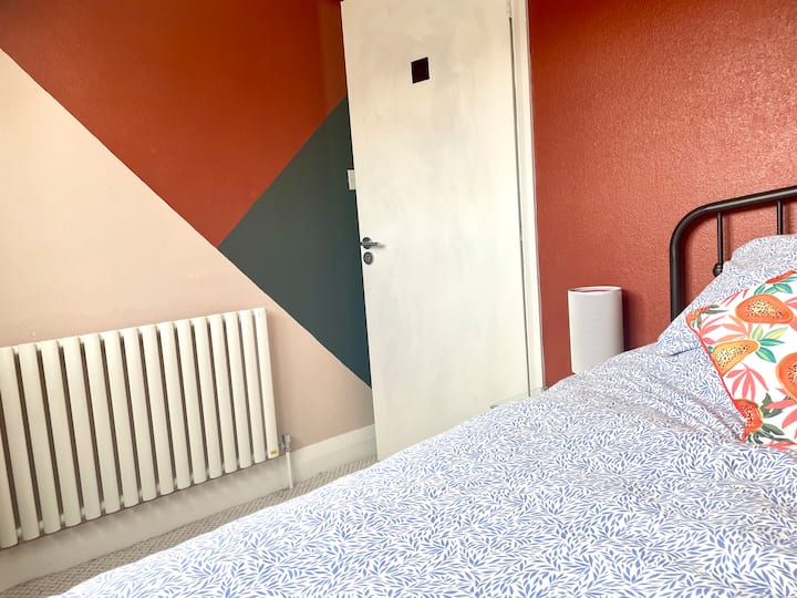 One single bed in a small room. 