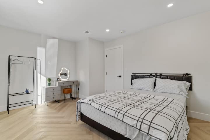 Floating queen bed with under lighting and hybrid firm mattress