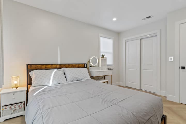 Upholstery headboard queen bed with charging station and solf boxspring mattress. 