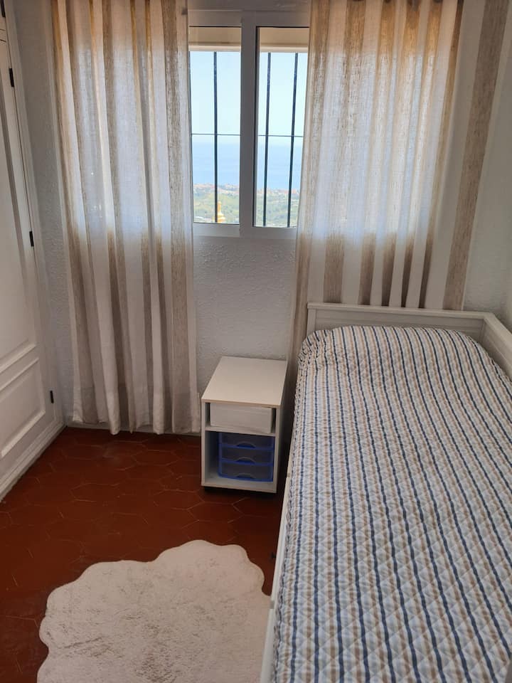 Another bedroom with a sofa bed.