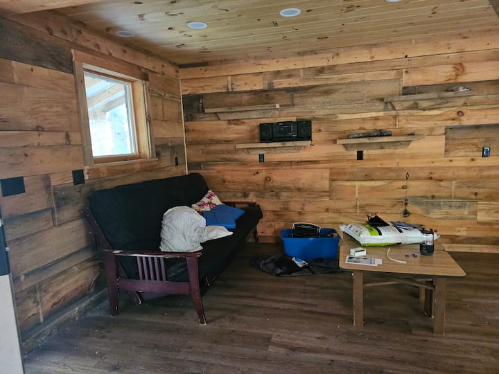 Rustic reclaimed wood interior walls of Hiker Delight Cabin