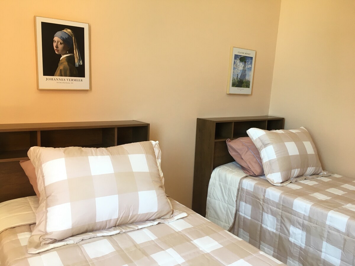 Kamer met eenpersoonsbedden 