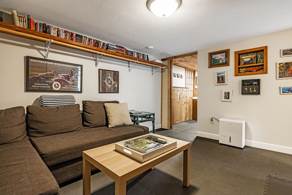 Second living area with TV and futon.