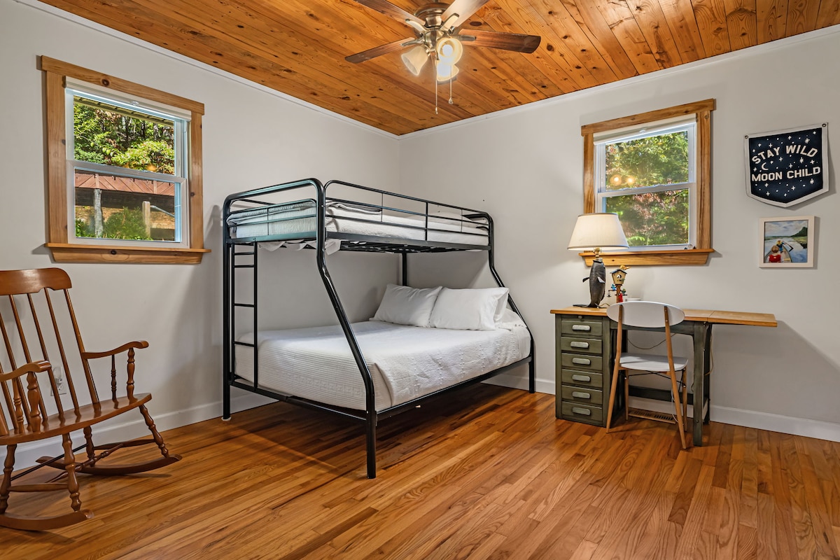 Third bedroom with bunk over double and closet space. 